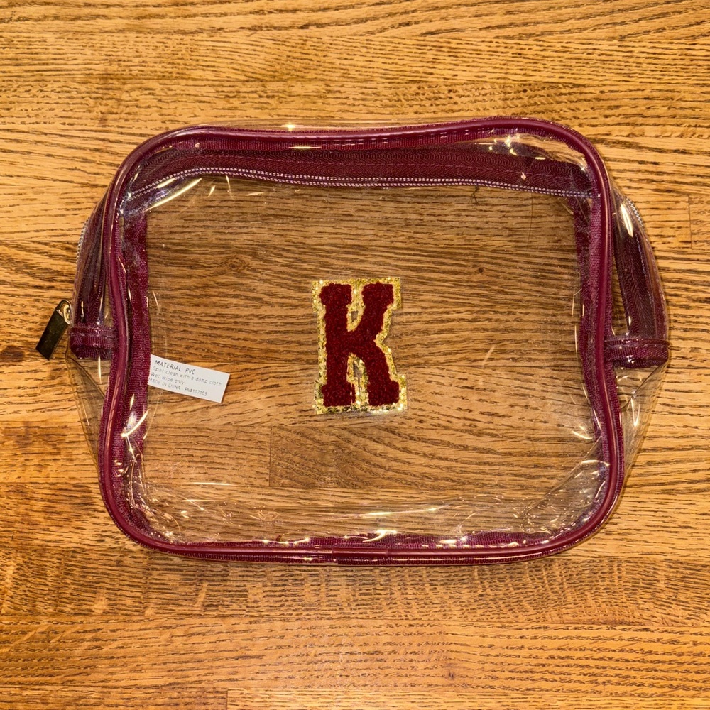 NWOT Clear Cosmetic Bag with Maroon Trim and K Patch